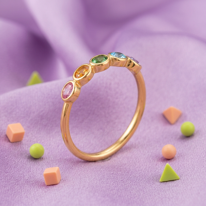 Rainbow Arc ring on lilac fabric with peach and lime geometric props