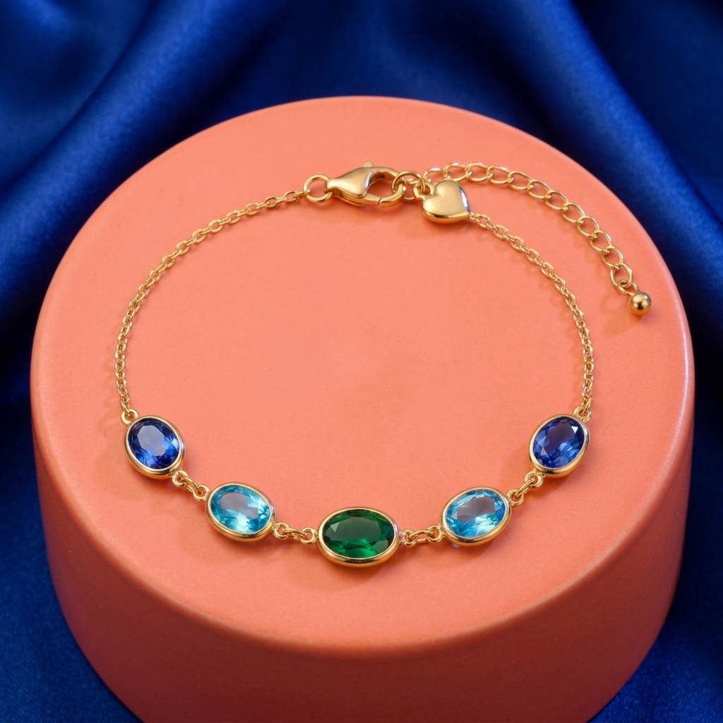 Complete Ocean Muse bracelet on coral pedestal against cobalt fabric