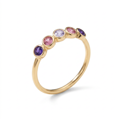 Violet Halo five-oval gold-tone ring concept on white background