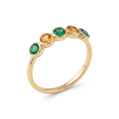 Emerald Dawn green and amber oval ring concept on a white background