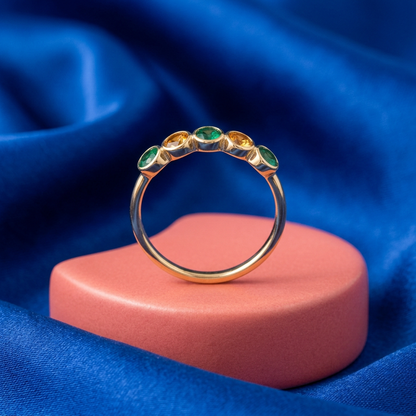 Emerald Dawn ring concept with coral pedestal and cobalt backdrop