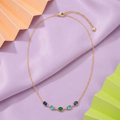 Sea Glass necklace on lilac silk with peach and lime paper shapes