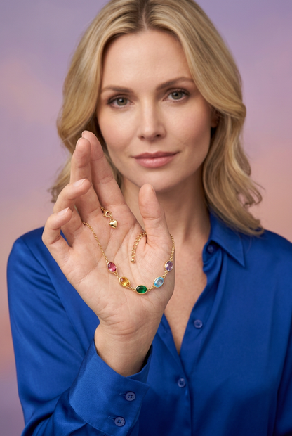 Blonde model in cobalt shirt presenting the colorful bracelet in an open palm