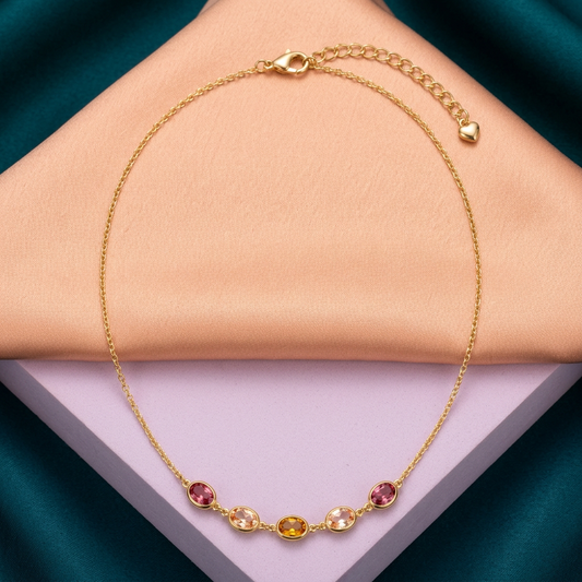 Rosy Horizon pink pale peach amber necklace on peach silk and lilac pedestal